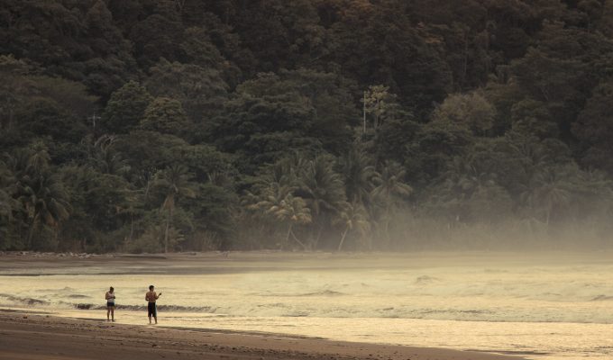 People hiking in the Marino Ballena National Park, beach.