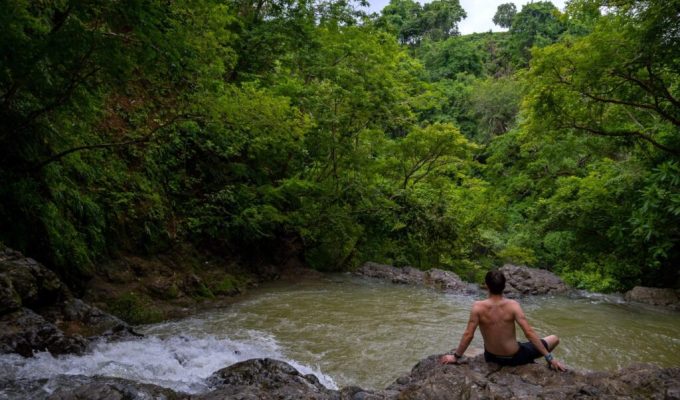 Man enjoy the Montezuma Waterfall - Costa Rica