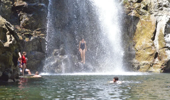 Take a shower in Montezuma Waterfall - Costa Rica