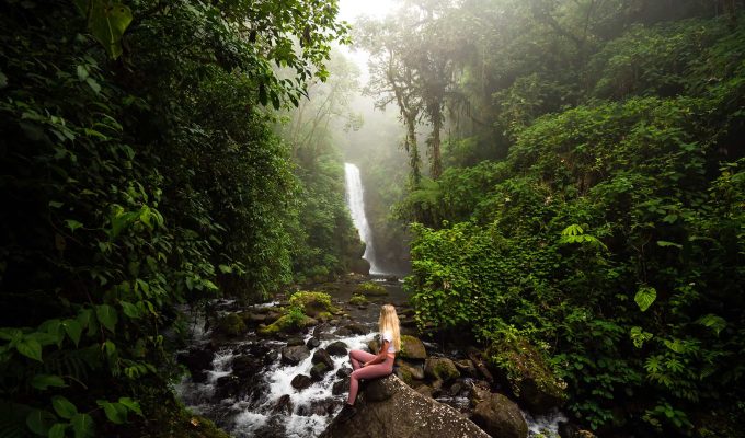 a girl in La Paz Waterfalls